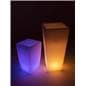 Large LED ice bucket pot next to small planter
