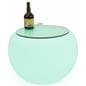 LED round coffee table with teal light and liquor bottle