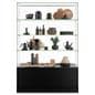 Free standing display case with fixed shelves