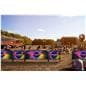 Custom cafe barrier used for crowd control at outdoor concert venue