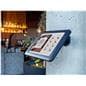 Desktop iPad holder showcasing the unit being mounted to a wall in a restaurant 