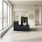Retail display pedestal being utilized in a store front space with all three size options exhibiting items on top