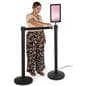 Floor standing digital sign stanchion accommodates other QueuePoles 