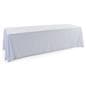 White polyester table cover with a draping display
