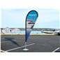 Custom Teardrop Flag in a marina parking lot