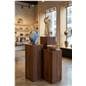 Wood grain pedestals in retail setting