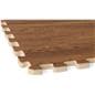 Foam wood floor tiles showing a close up of one of the 5/8 inch thick tile