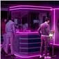 Mobile rechargeable kiosk showcasing someone interacting with this unit as a self service kiosk to get tickets at a theater