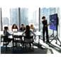 Mobile TV cart being used in a boardroom setting