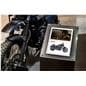 Digital signage ePaper being showcased in a showroom floor advertising a motorcycle